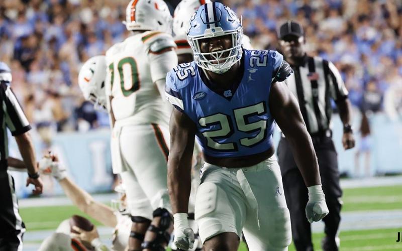 Senior defensive lineman for the University of North Carolina Tar Heels announces he is returning for his fifth year and will not declare for the 2024 NFL Draft in May of 2024. Photo by Jim Hawkins of Inside Carolina