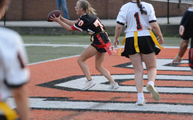 Pictured is Hannah Harris as she catches the first touchdown of the game for the Seniors.