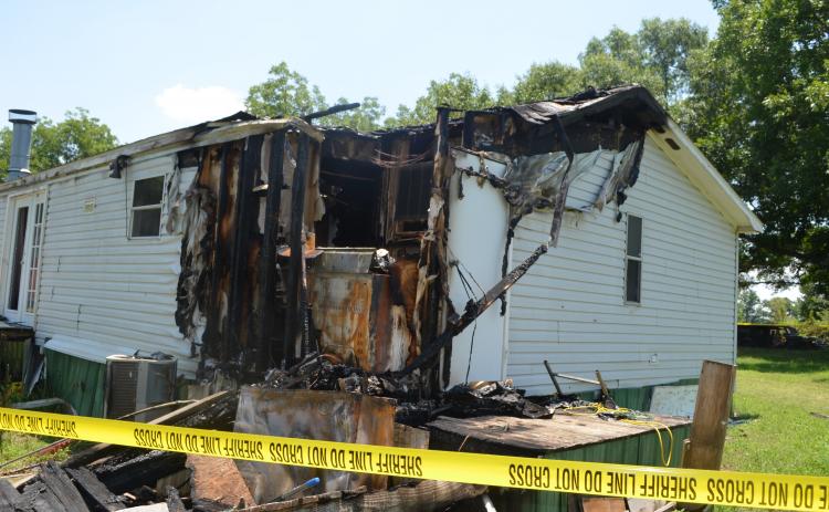 Authoritie have taken out arrest warrants for a Vanna man they claim intentionally set fire to this home on Joe Findley Road.