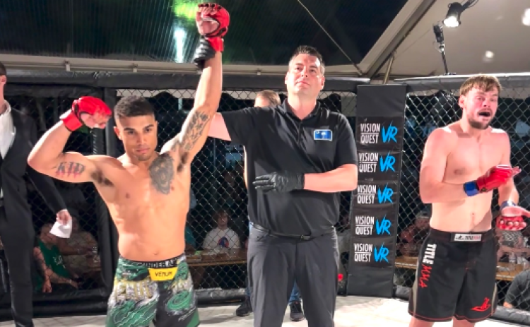 MMA (Mixed Martial Arts) fighter Brandon Webb (pictured left) from Contemporary Martial Arts of Hartwell wins the fight against Tony Rogers (pictured right) on Saturday, April 15 in Greenville, S.C.