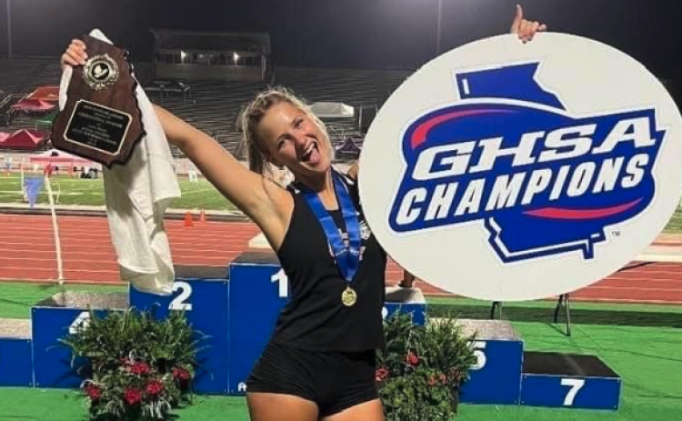 Junior pole vaulter Amelia Johnson celebrates after winning back-to-back state championships at the GHSA 3A State meet on May 11-13 in Albany.