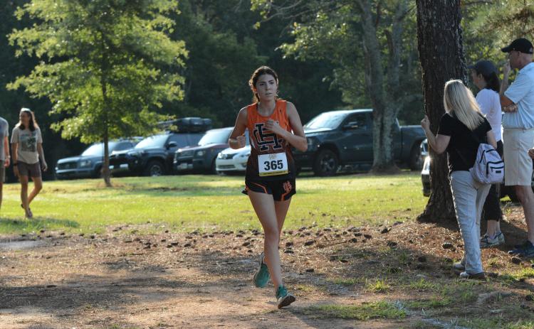 Senior Melody Blomberg placed inside the Top 100 in the North Hall Invitational at North Hall High School Sept. 7.