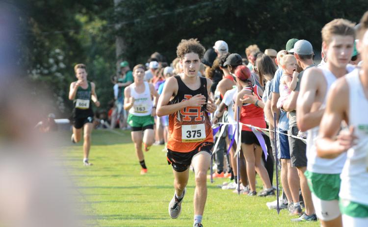 Junior Nate Harris comes to the finish line as he places 33rd at the Biscuit Cafe Invitational at North Oconee Aug. 30.