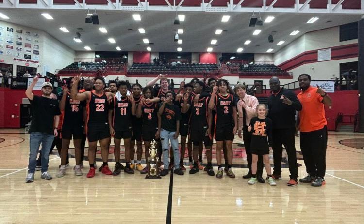The Hart County High School boys basketball team pulled off the upset over No. 2 ranked Hebron Christian to capture the 2023-2024 Region 8-AAA Championship on Feb. 16, 59-53.
