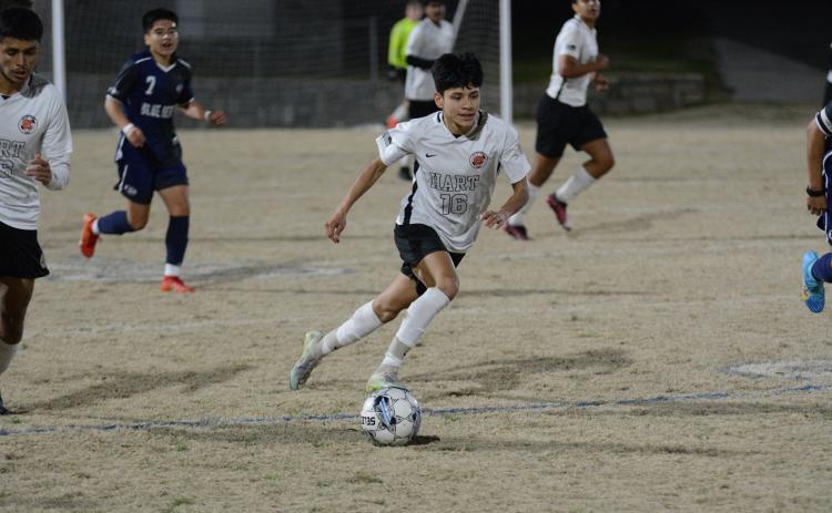 Pictured is senior midfielder Luis Genchi as he scored the lone goal for the Dogs in the 9-1 loss against Elbert County on Feb. 9