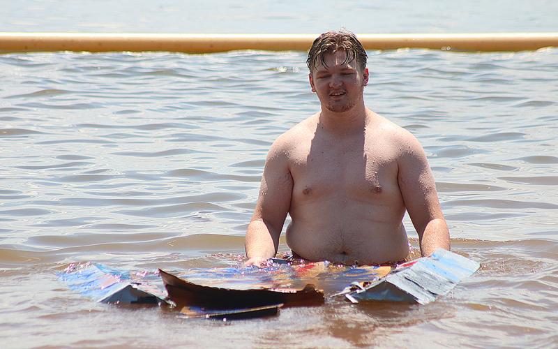 Bulldog band members compete to see who has the best makeshift boat.