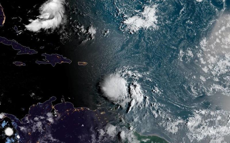 Photo submitted by NOAA — Tropical Storm Dorian is shown in NOAA satellite imagery approaching Puerto Rico Tuesday morning.      Previous     Next