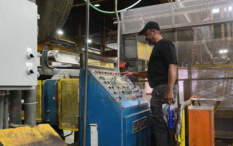 Sunshots by Michael Hall — Thomas Newman stands behind the draw bench where he once worked during his time at the Tenneco/Monroe facility Hartwell.