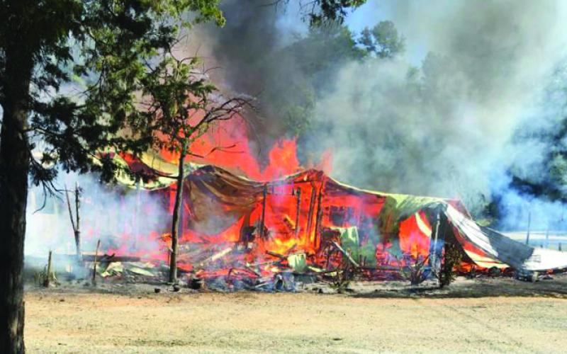 Photo submitted The Lake House Tavern burns Saturday morning on Rock Springs Road.