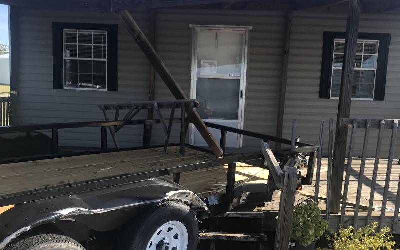 Photo submitted — A trailer is shown crashed into a porch on the front of the office at Rockland Mini Buildings in Hartwell after an SUV drove through the lot on E. Franklin Street sometime early Sunday morning, Sept. 22, damaging property.