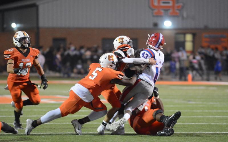 Sunshot by Grayson Williams Hart County Quarterback Luke Lee throws a pass through the middle of the Jefferson defense on Oct. 11 at Herndon Stadium.