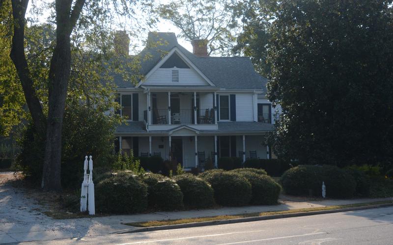 Sunshot by Michael Hall — The Skelton House on Benson Street is shown. The city’s zoning commission recommended last week that the city council deny a rezoning request that would open the door for a theater and event space there.