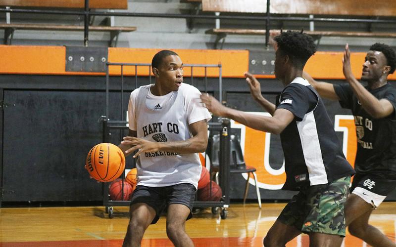 Sunshot by Grayson Williams — Shone Webb looks for a teammate to pass to during a practice drill on Oct. 29 at Hart County High School.