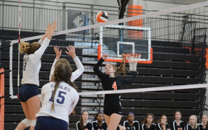 Sunshot by Grayson Williams — Ashley Chapman goes for the kill for the Volleydogs in the Area 8-AAA tournament at Hart County High School. The team finished in fourth place, qualifying it for the state tournament.