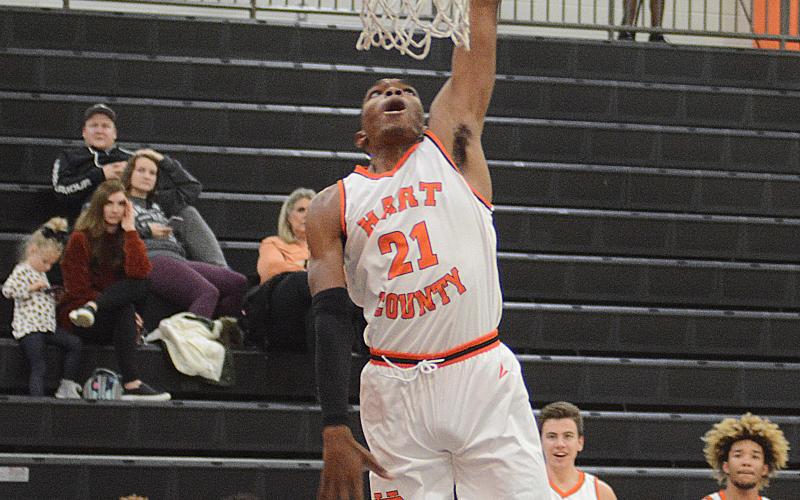 Shone Webb dunks during a scrimmage on Tuesday at Hart County High School.