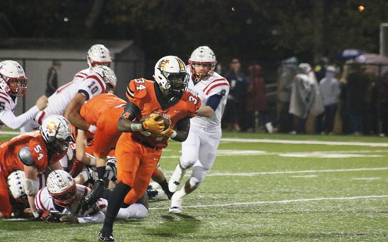 J.L. Lackey looks for running room against Haralson in the first round of the playoffs on Nov. 15 at Herndon Stadium.
