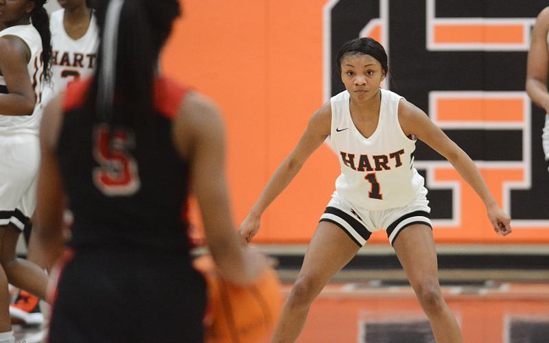 Sunshot by Michael Hall - Valasha Carter zeroes in on a Stephens County opponent on Jan. 24 at Hart County High School.