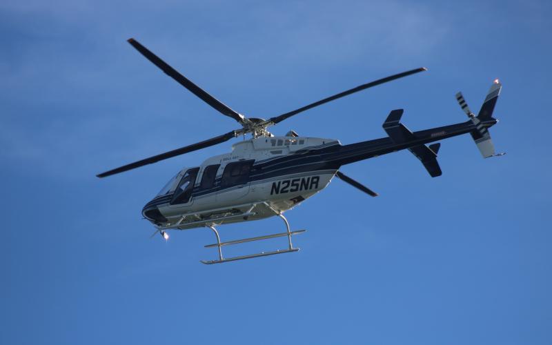 A Georgia Department of Natural Resources helicopter flies above Lake Hartwell Thursday morning in search of a missing 69-year-old Illinois man who rented a boat from Hartwell Marina Wednesday that was later found unoccupied.