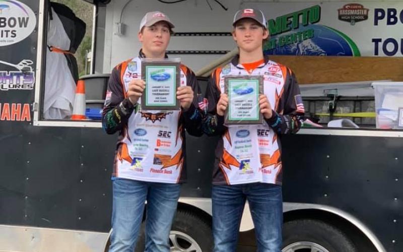 Photo submitted - Parker Dickerson, left, Rafe Maxwell, right, show off their third-place plaques at the PBC tournament on  Lake Hartwell.