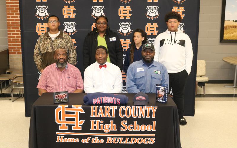 Sunshot by Grayson Williams - Pictured from left to right, Jacob Burton, Loretta Burton, Kameron Montgomery, Garrett Burton, sitting, Rod Burton, Corbin Burton and Stephen Hunter.