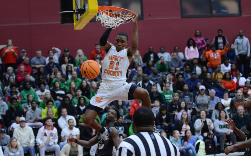 Sunshot by Grayson Williams- Hart County’s Shone Webb dunks against Franklin County at Emmanuel College on Feb. 7.