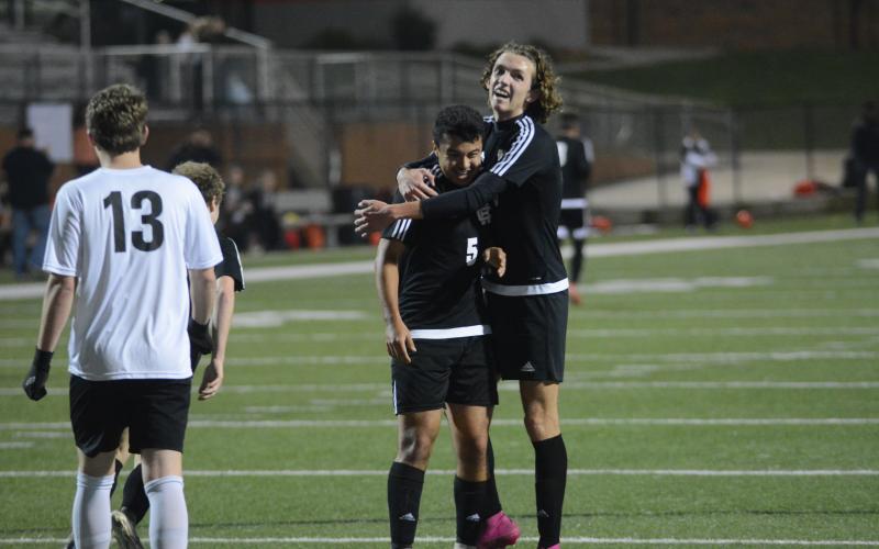 Sunshot by Grayson Williams Renso Escobedo, left, celebrates with Lincoln Zemaitis following Escobedo’s goal against Oglethorpe County at Hart County High School on Feb. 25.