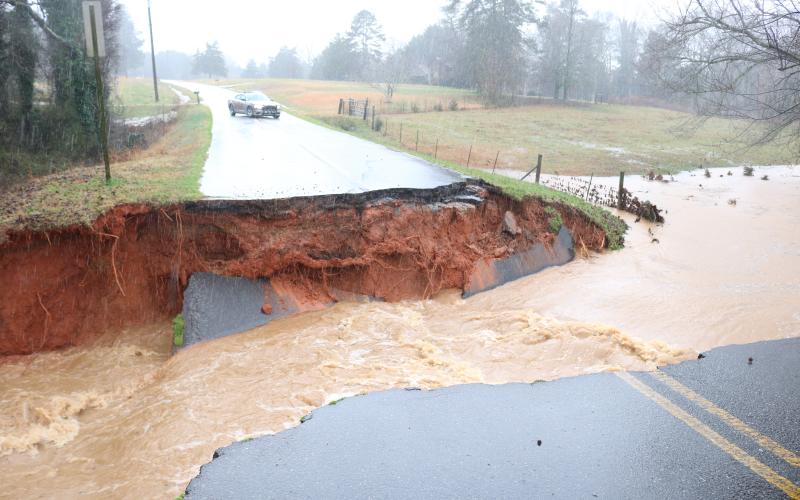 Sunshot by Grayson Williams - A flash flood created a temporary raging river and washed out Deer Run Lane on Thursday, Feb. 6, when torrential downpours caused flooding around Hart County.