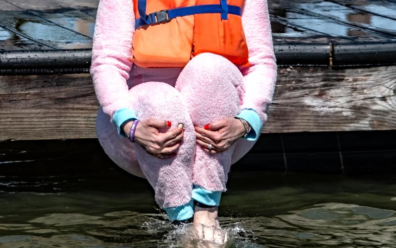 Jodi Ford, warden of Whitworth Women’s facility, braces for the cold water.