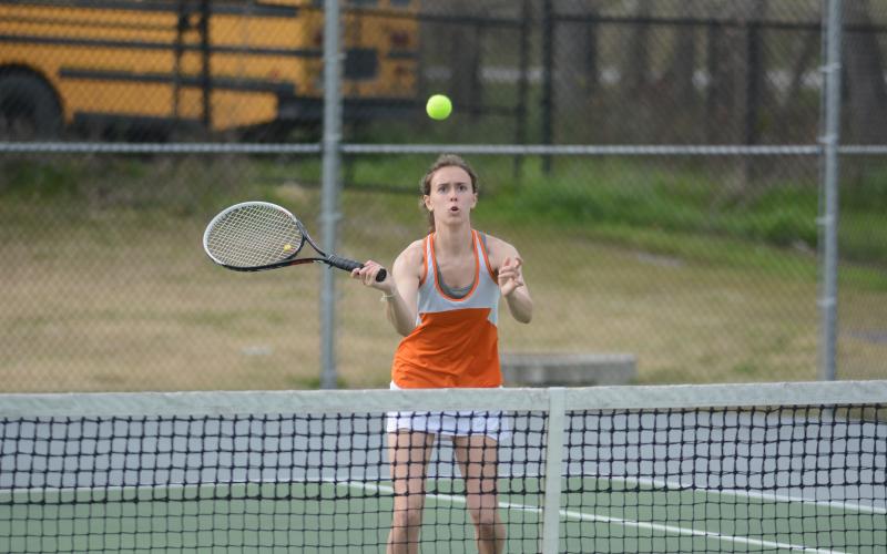 Sunshot by Grayson Williams - Sydney Smith returns a volley at Hart County High School on March 12.