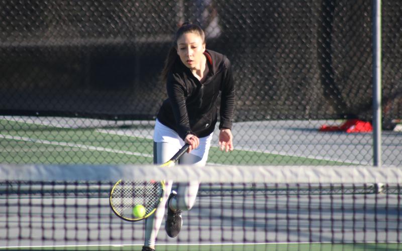Sunshot by Grayson Williams Naomi Noriega hustles to return a ball last Thursday against Madison County.