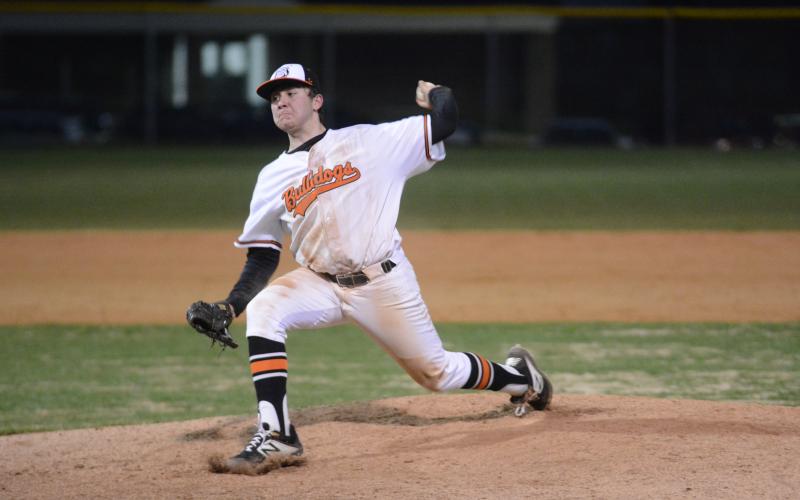 Sunshot by Grayson Williams - Hart County pitcher J.P. White deals from the mound Friday at Saye Field where the Bulldogs rallied to beat Stephens County 7-4.