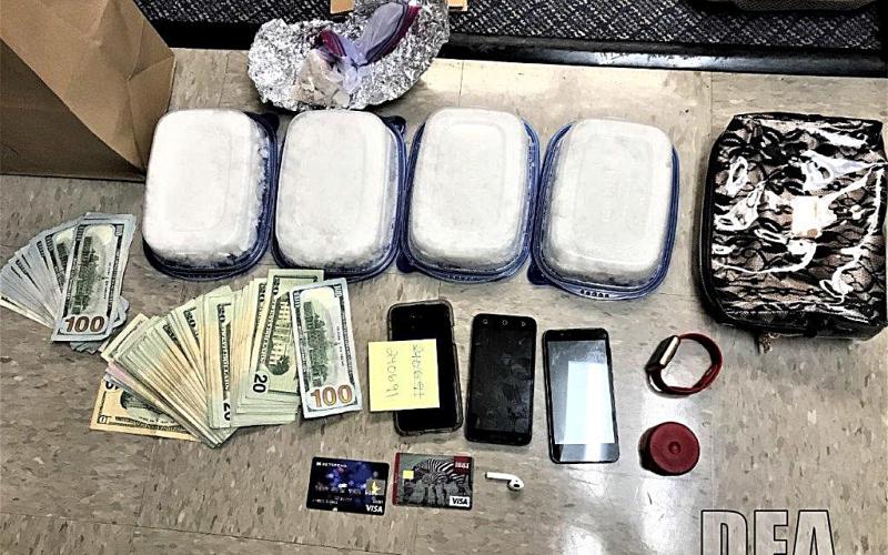 Drugs, money and other items confiscated as part of a two-year federal, state and local drug investigation are shown.