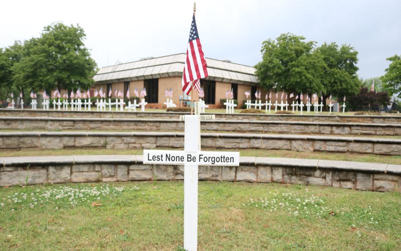Crosses with flags are on display on the Hart County Courthouse lawn to honor Hart County's fallen.