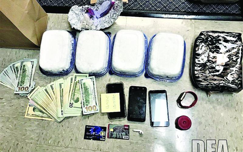 Photo submitted — Methamphetamine, cash, cellphones, and other items seized as part of a federal investigation are shown.
