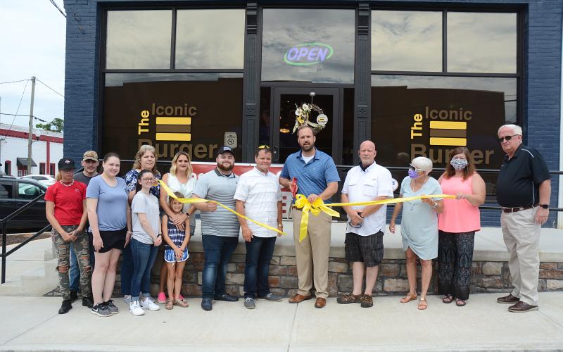 Sunshot by Michael Hall — Pictured are Mariah Hobbs, from left to right, Brady Dobson, Breanna Stansell, Angie Hickey, Madison Fleeman, Leah Carey and Trinity Carey, Joshua Sellers, David Sellers, Mayor Brandon Johnson, Hartwell city councilman Tray Hicks, Marylynn Johnson and Melissa Weatherbee, both with Hartwell Main Street, and Hartwell city councilman Doc Ayers.
