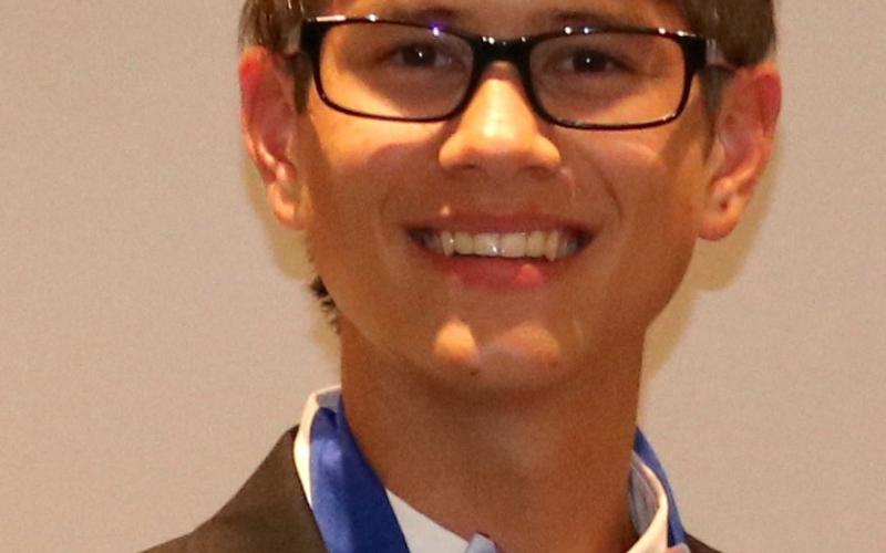 Below, Ben Tellano wears the medal he received for winning second-place in the citizenship competition.