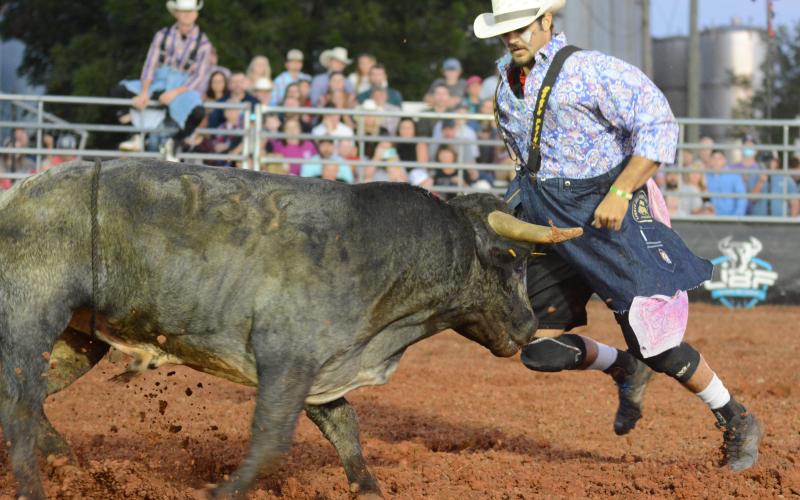Seay barely misses getting hit by the bull he fought.