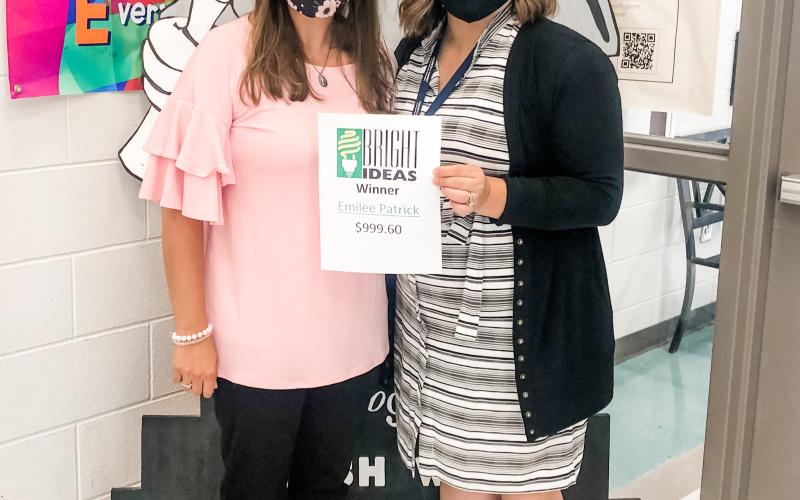 Photos submitted North Hart’s Emilee Patrick, above left, is pictured with principal Haley Smith.