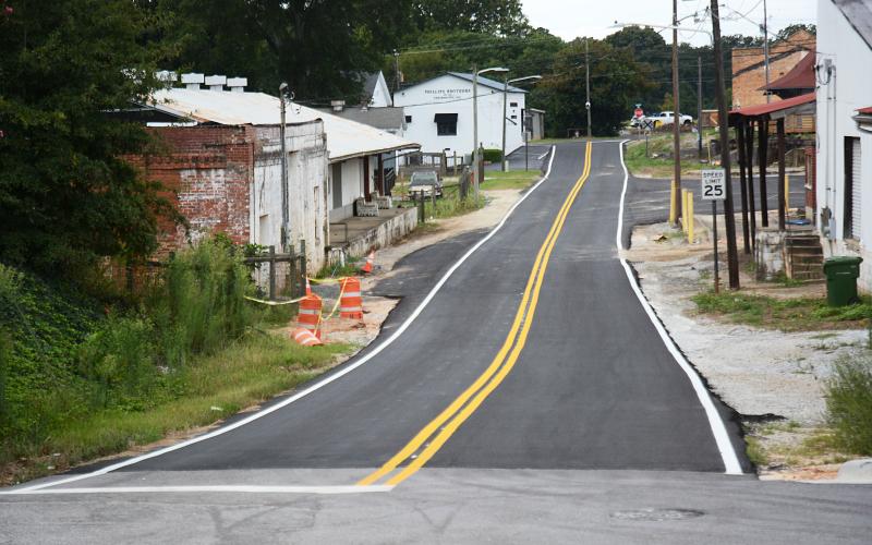 Railroad Street in downtown Hartwell is shown recently with fresh pavement and fresh lines. Sunshot by  Michael Hall