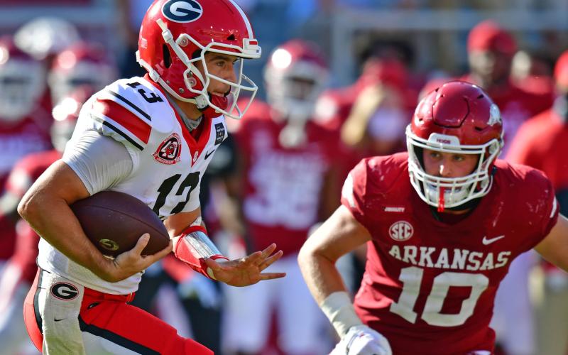 Photo submitted Stetson Bennett IV runs with the football against Arkansas on Sept. 26.