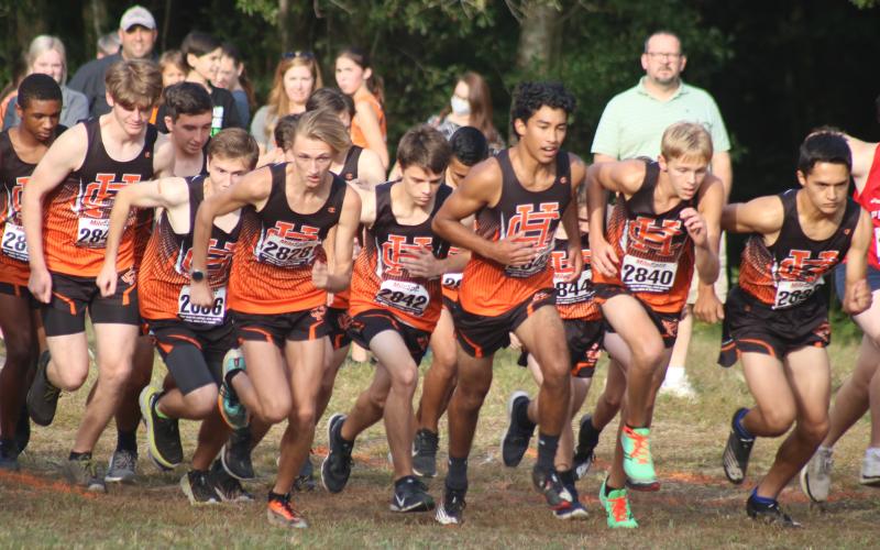 Sunshot by Grayson Williams The Hart County boys cross country team starts the race hosted by Hart County High School on Tuesday, Sept. 22.