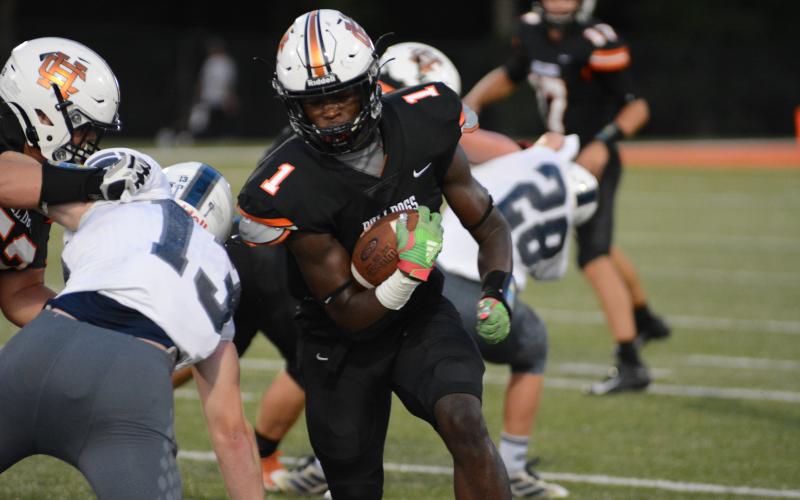 Sunshots by Grayson Williams Hart County’s Malachi Thomas powers past tacklers against White County on Sept. 11 at Herndon Stadium at Hart County High School.