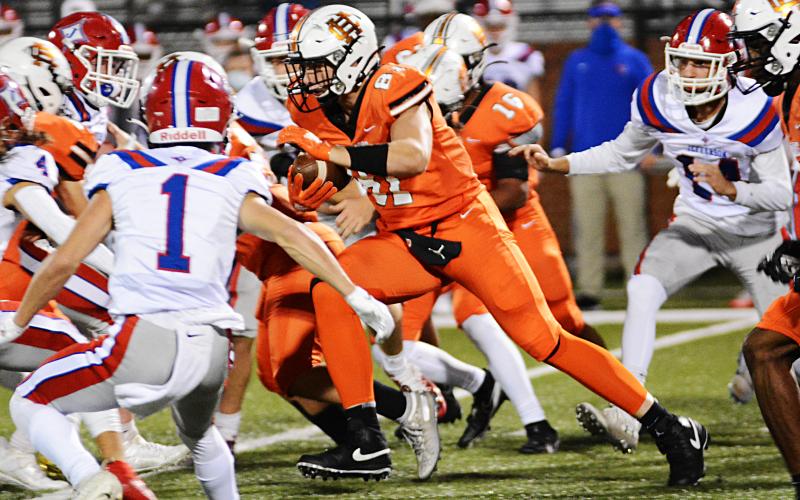 Sunshot by Michael Hall Tight End Cane Berrong looks for running room on a kickoff return on Friday, Oct. 2, at Herndon Stadium in the Bulldogs’ 26-19 loss.