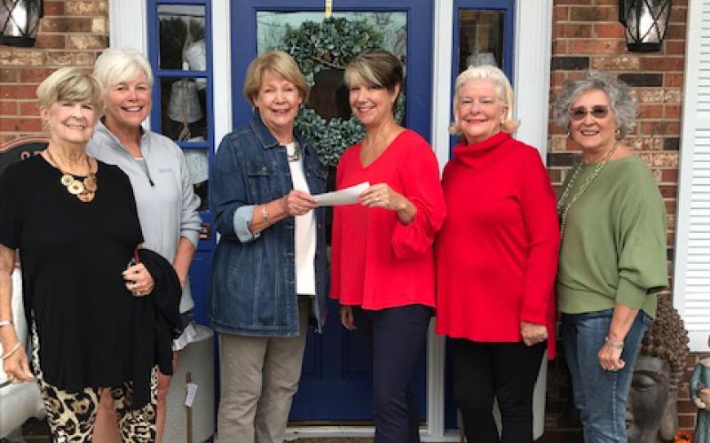 Pictured are, from left to right, Tammy Hutchinson, Henley Cleary and Nancy Hardigree, of the Main Street design committee, Cheryl Hooker and Marcia Chatham, owners of Porch and Home, and Pudge Smith with Hartwell Main Street design committee.