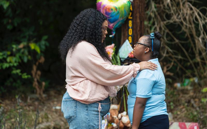Nina Lee, left, writer, director and actor in “Artistic,” acts in a scene with Hart County High School student and homecoming queen Taylor Freeman recently in Atlanta.