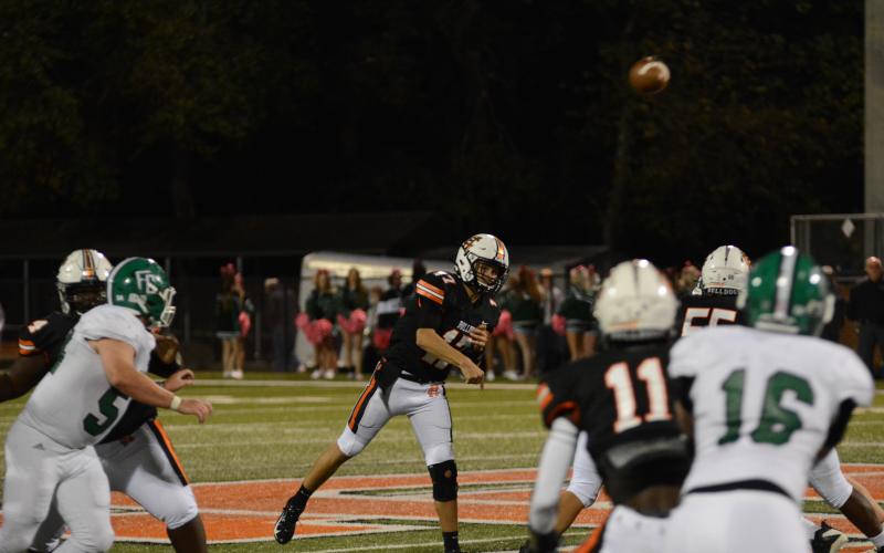 Hart County Quarterback Austen Whitworth throws a pass on Oct. 15 against Franklin county at Herndon Stadium.
