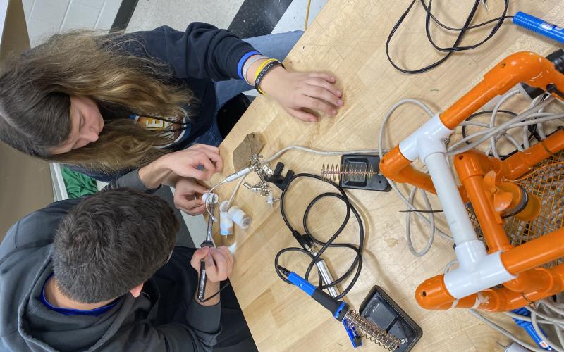 Students in last year’s engineering and technology class at Hart College and Career Academy taught by Marvin McDuffie work on underwater robots.