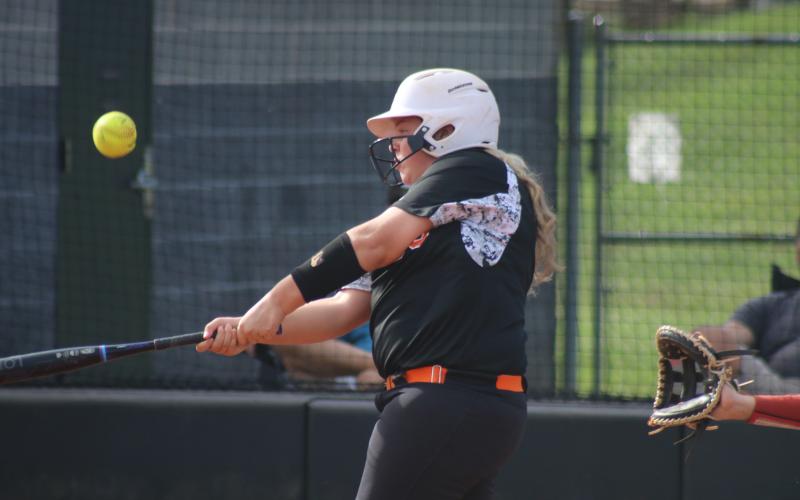Sunshots by Grayson Williams Chloe Marchman connects with the ball at the plate during the Lady Diamond Dogs’ win over East Jackson at home on Monday, Oct. 12.