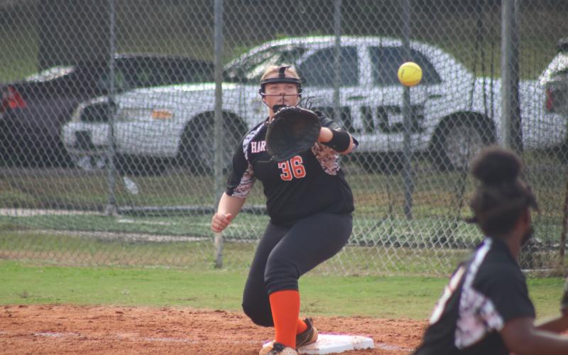 Chloe Marchman takes a throw at first base for an out against East Jackson on Monday.