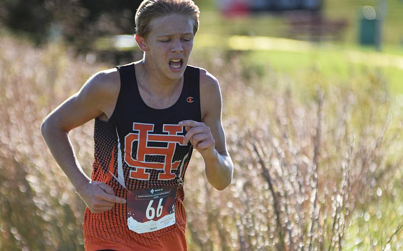 Hart County Runners Zachary Peters and Melody Blomberg run in the Region 8-AAA cross country meet last week.